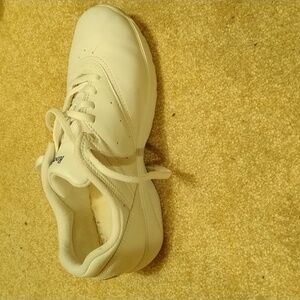 White leather tennis shoe, size 6